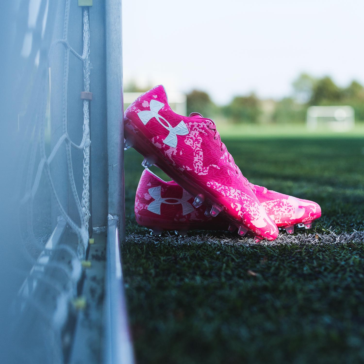 Pink under armour on sale boots